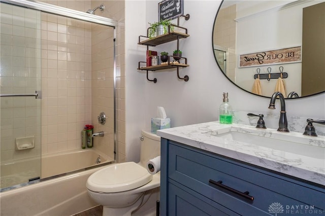 6475 Landsend Ct, Butler Township, OH 45414 - bathroom featuring vanity, shower / bath combination with glass door, and toilet