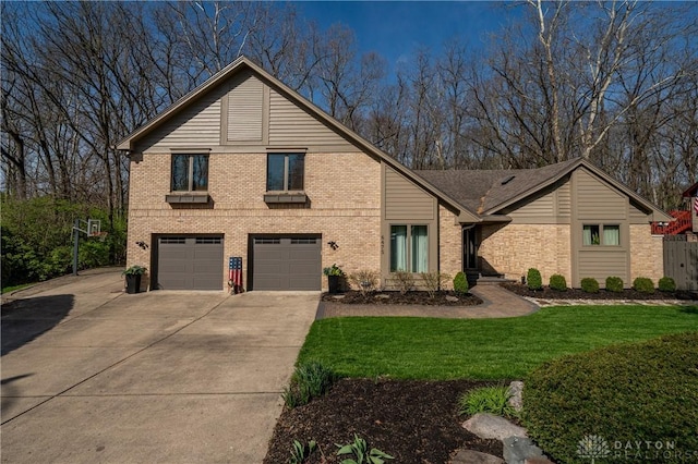 6475 Landsend Ct, Butler Township, OH 45414 - view of front of property with a garage, driveway, a front lawn, and brick siding