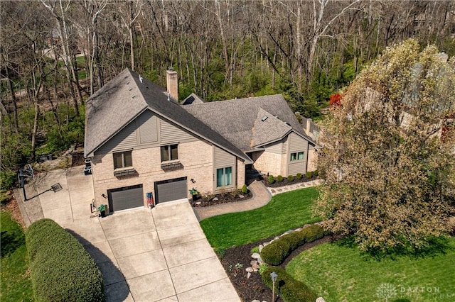 6475 Landsend Ct, Butler Township, OH 45414 - drone / aerial view featuring a wooded view