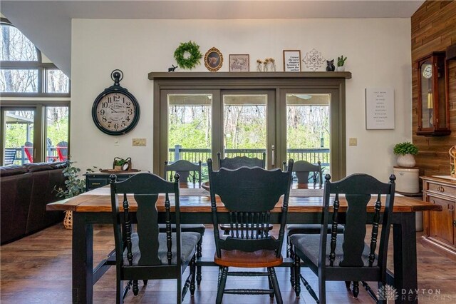 6475 Landsend Ct, Butler Township, OH 45414 - dining space with dark wood-style floors and a wealth of natural light