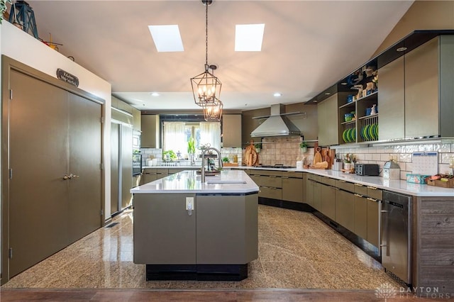 6475 Landsend Ct, Butler Township, OH 45414 - kitchen with granite finish floor, light countertops, a sink, wall chimney exhaust hood, and a skylight