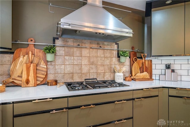 6475 Landsend Ct, Butler Township, OH 45414 - kitchen with backsplash, range hood, gas stovetop, and light countertops
