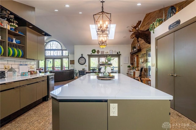 6475 Landsend Ct, Butler Township, OH 45414 - kitchen featuring light countertops, light speckled floor, a center island, and recessed lighting