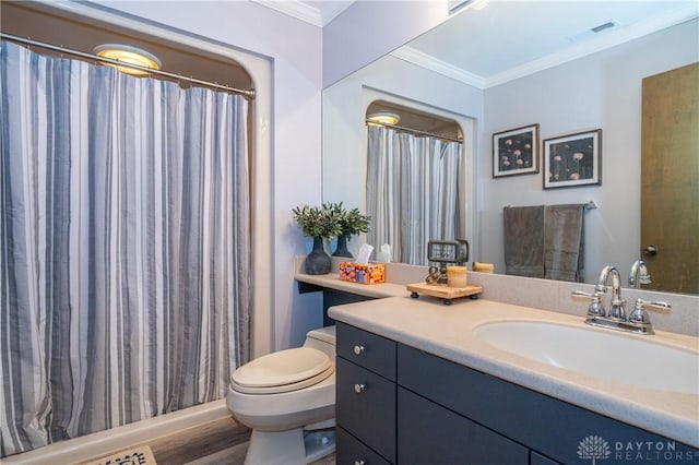 6475 Landsend Ct, Butler Township, OH 45414 - bathroom with crown molding, wood finished floors, vanity, toilet, and visible vents
