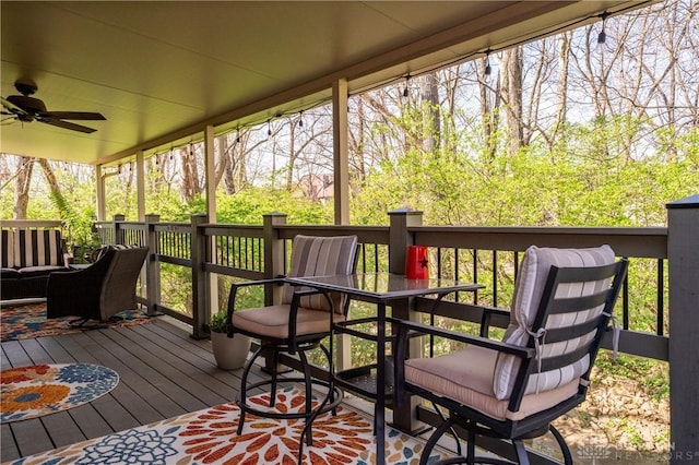 6475 Landsend Ct, Butler Township, OH 45414 - wooden deck with outdoor dining area and a ceiling fan
