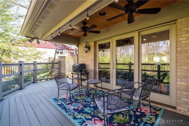6475 Landsend Ct, Butler Township, OH 45414 - deck with ceiling fan, french doors, and outdoor dining space