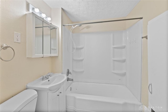 40 E Pease Ave, Dayton, OH 45449 - bathroom featuring toilet, shower / bathtub combination, vanity, and a textured ceiling