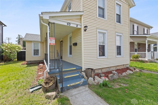 40 E Pease Ave, Dayton, OH 45449 - traditional-style house featuring a porch and a front yard