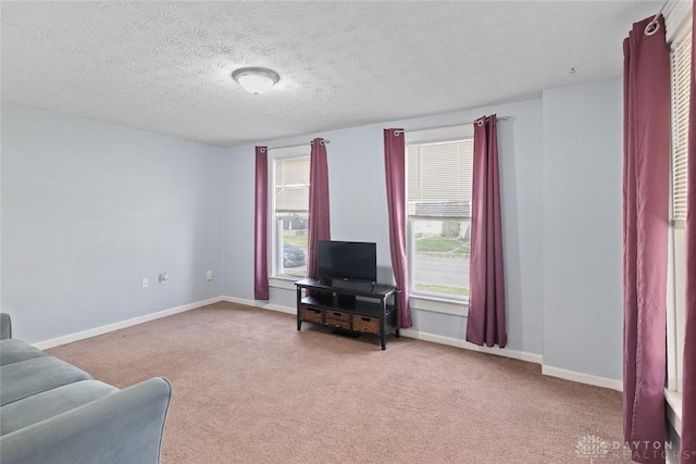 40 E Pease Ave, Dayton, OH 45449 - living room with a healthy amount of sunlight, carpet flooring, and baseboards