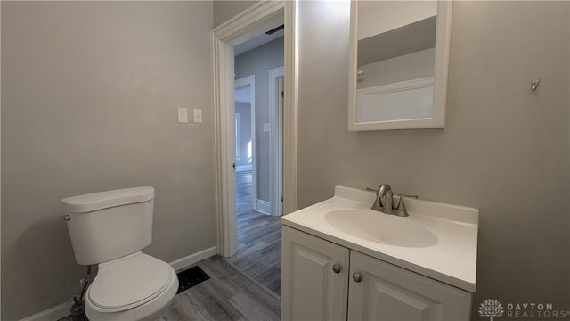 1105 Pursell Ave, Dayton, OH 45420 - bathroom with vanity and wood finished floors
