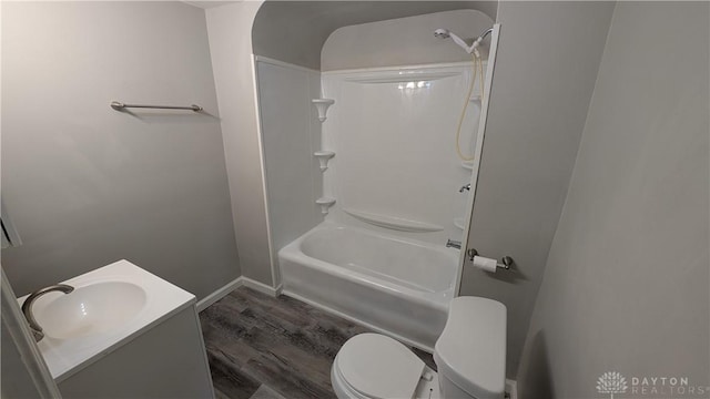 1105 Pursell Ave, Dayton, OH 45420 - bathroom with wood finished floors, tub / shower combination, and vanity