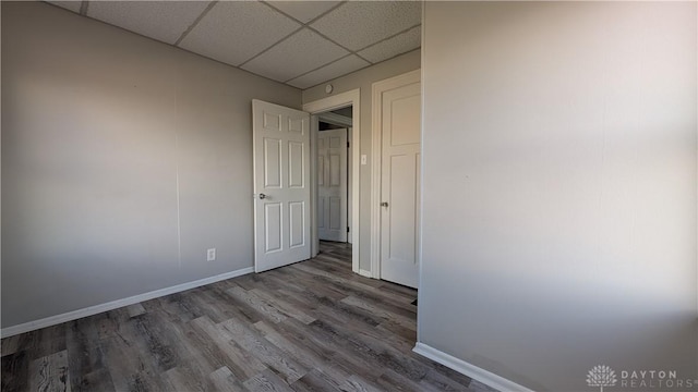1105 Pursell Ave, Dayton, OH 45420 - spare room with wood finished floors and a drop ceiling