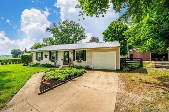 4065 Apache Trl, Jamestown Vlg, OH 45335 - ranch-style home featuring a garage, concrete driveway, and metal roof