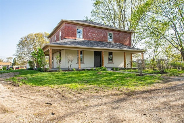 117 Montgomery Ave, Franklin, OH 45005 - farmhouse featuring a front yard and covered porch