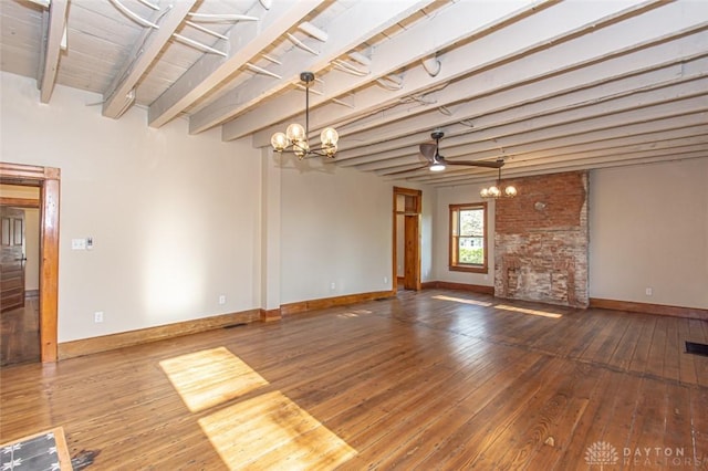 117 Montgomery Ave, Franklin, OH 45005 - unfurnished living room featuring a chandelier, hardwood / wood-style floors, beam ceiling, and baseboards