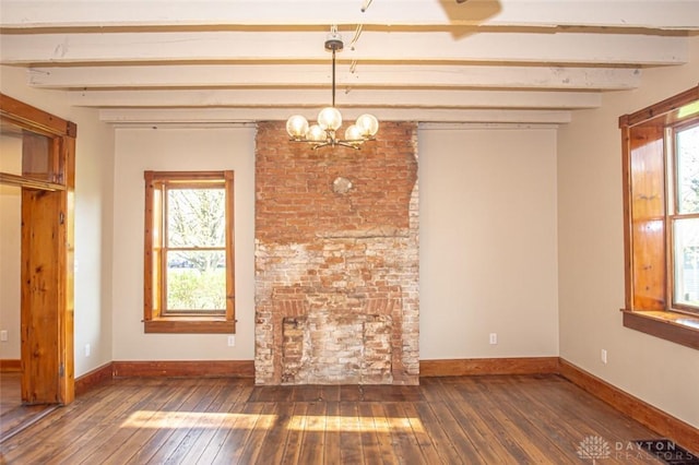 117 Montgomery Ave, Franklin, OH 45005 - unfurnished dining area with hardwood / wood-style floors, baseboards, an inviting chandelier, and beamed ceiling