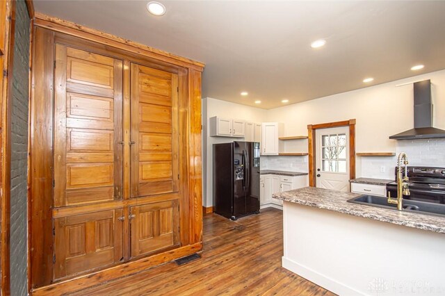117 Montgomery Ave, Franklin, OH 45005 - kitchen featuring wall chimney exhaust hood, dark wood-style floors, recessed lighting, open shelves, and black appliances