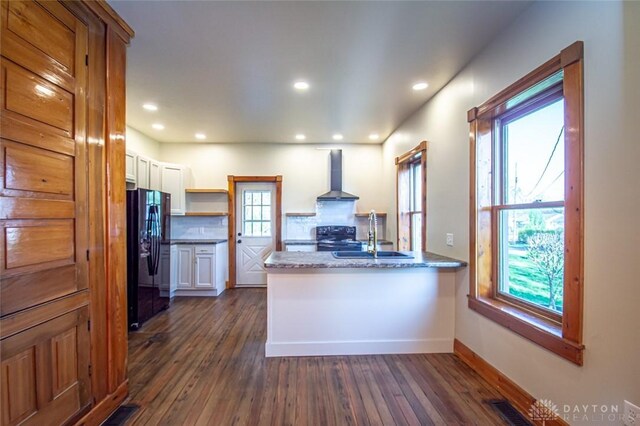 117 Montgomery Ave, Franklin, OH 45005 - kitchen with open shelves, visible vents, a sink, wall chimney exhaust hood, and black appliances