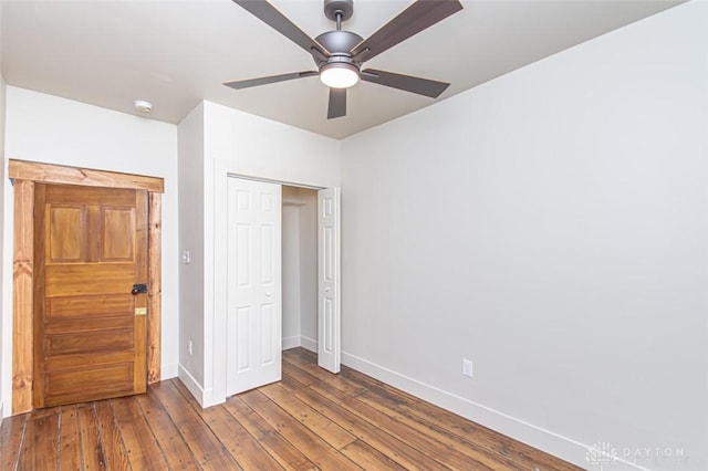 117 Montgomery Ave, Franklin, OH 45005 - unfurnished bedroom with a ceiling fan, baseboards, a closet, and wood-type flooring