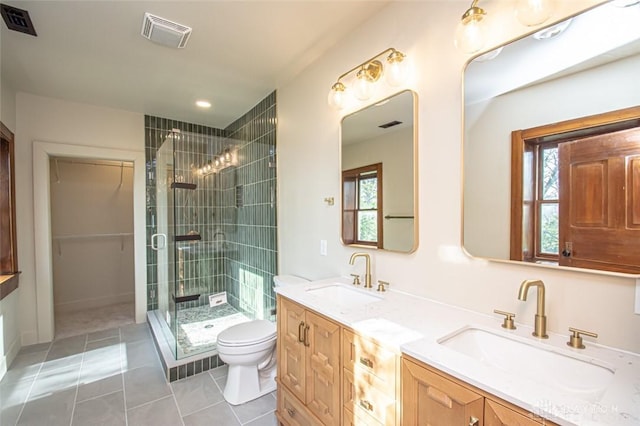 117 Montgomery Ave, Franklin, OH 45005 - bathroom with tile patterned flooring, a sink, visible vents, and a stall shower