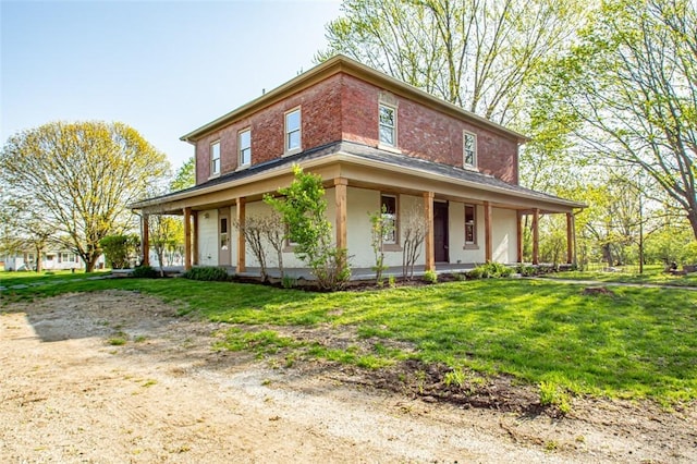 117 Montgomery Ave, Franklin, OH 45005 - farmhouse-style home featuring an attached garage, a porch, and a front lawn