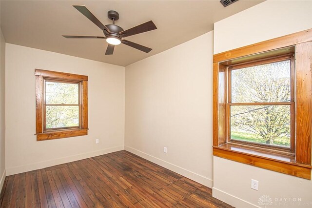117 Montgomery Ave, Franklin, OH 45005 - spare room with dark wood finished floors, baseboards, and plenty of natural light