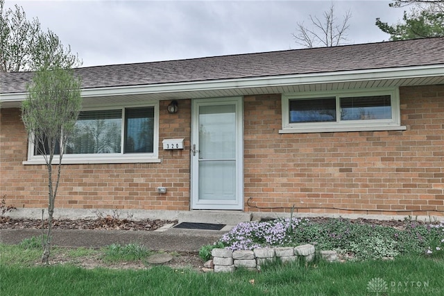 320 Orangewood Dr, Dayton, OH 45429 - entrance to property with brick siding and a shingled roof
