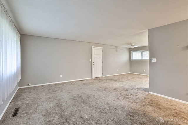320 Orangewood Dr, Dayton, OH 45429 - unfurnished room with carpet floors, a ceiling fan, visible vents, and baseboards