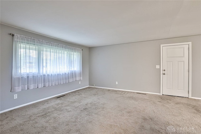 320 Orangewood Dr, Dayton, OH 45429 - carpeted empty room featuring visible vents and baseboards