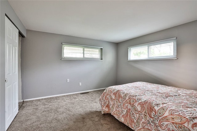 320 Orangewood Dr, Dayton, OH 45429 - bedroom with a closet, visible vents, carpet flooring, and baseboards
