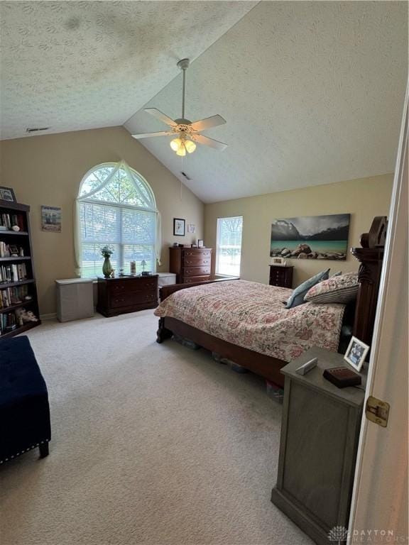 9632 Belfry Ct, Dayton, OH 45458 - carpeted bedroom featuring vaulted ceiling, a textured ceiling, and a ceiling fan