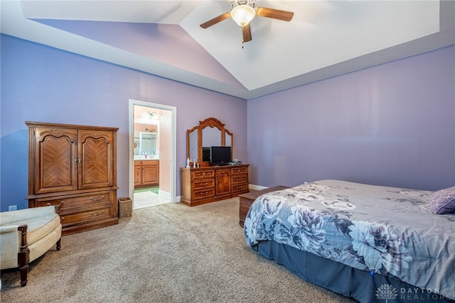 bedroom featuring carpet flooring, ceiling fan, baseboards, ensuite bathroom, and lofted ceiling