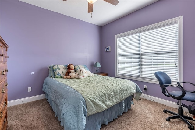 bedroom featuring carpet floors, baseboards, and a ceiling fan