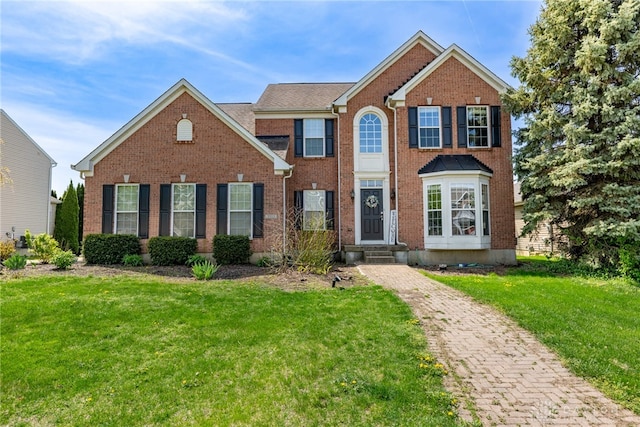 3513 Black Squirrel Way, Springboro, OH 45005 - view of front of property with a front yard and brick siding