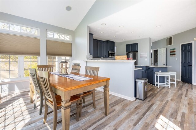3513 Black Squirrel Way, Springboro, OH 45005 - dining room featuring light wood-type flooring, baseboards, and recessed lighting