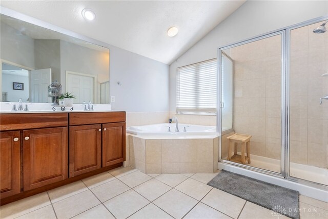 3513 Black Squirrel Way, Springboro, OH 45005 - full bath with a bath, a shower stall, tile patterned floors, vaulted ceiling, and double vanity