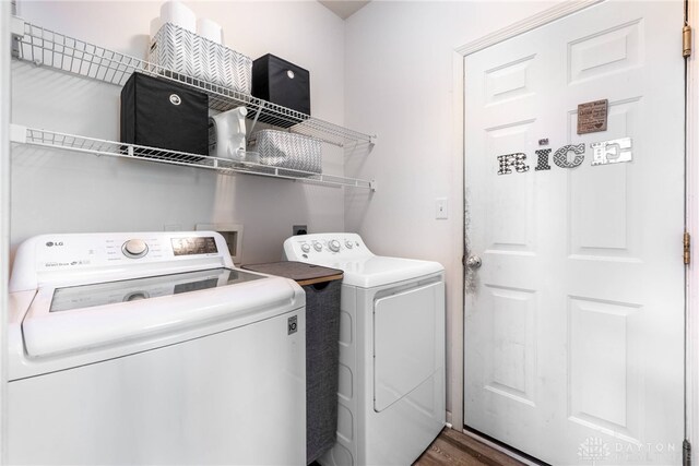 3513 Black Squirrel Way, Springboro, OH 45005 - laundry room with separate washer and dryer and wood finished floors