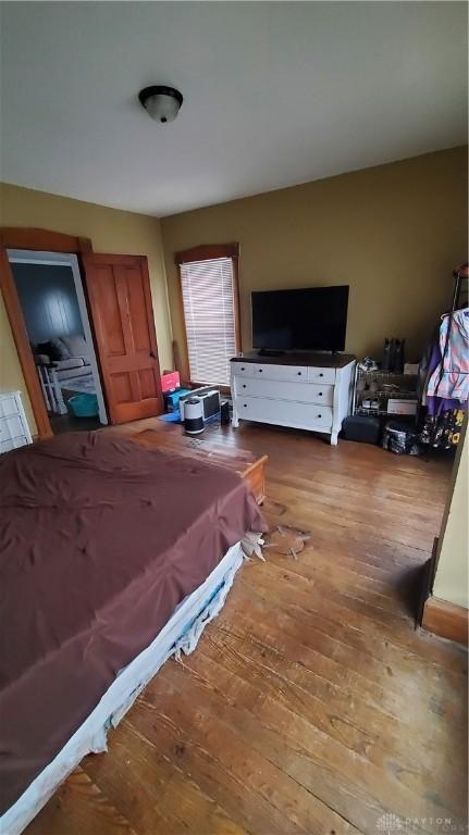bedroom featuring hardwood / wood-style floors