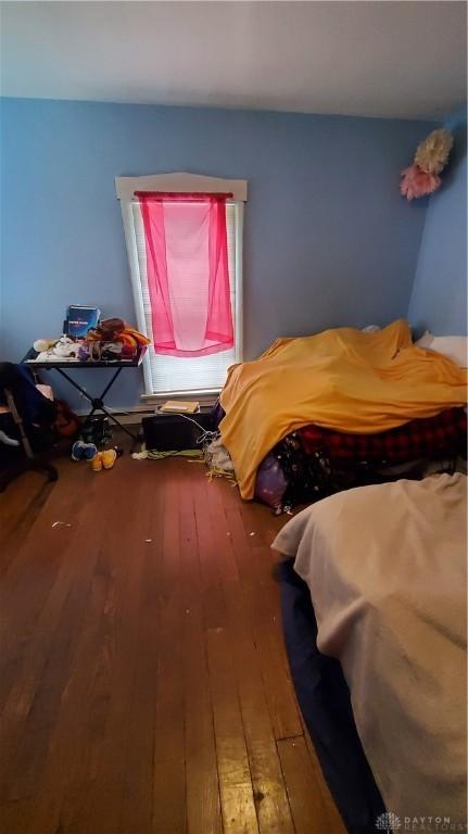 bedroom featuring hardwood / wood-style floors