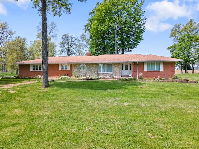2848 Hollansburg Sampson Rd, New Madison, OH 45346 - ranch-style house with a front yard, a chimney, and brick siding