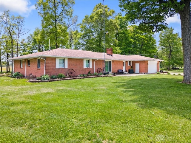 2848 Hollansburg Sampson Rd, New Madison, OH 45346 - ranch-style house with a chimney, brick siding, a front lawn, and a garage