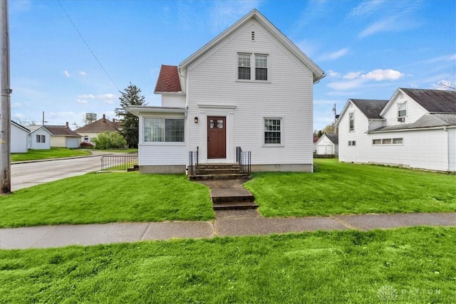 203 W Plum St, Saint Paris, OH 43072 - traditional-style home with a front yard and a residential view
