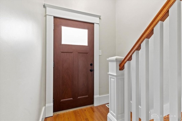 203 W Plum St, Saint Paris, OH 43072 - entrance foyer featuring light wood-style floors and stairway