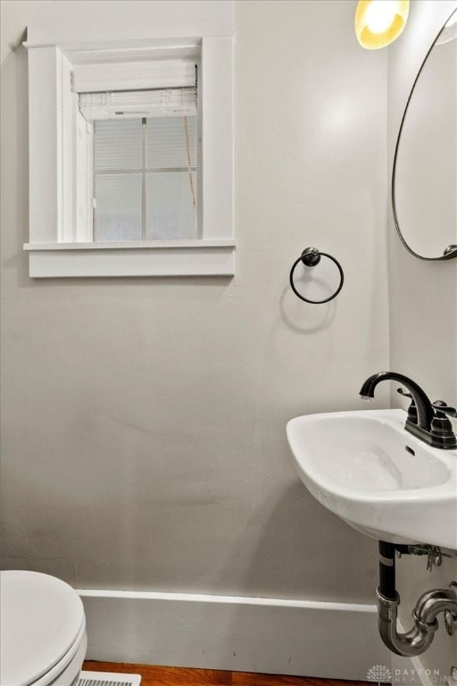 203 W Plum St, Saint Paris, OH 43072 - bathroom with a sink and toilet