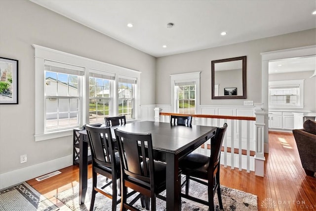 203 W Plum St, Saint Paris, OH 43072 - dining space featuring light wood-style floors, wainscoting, and recessed lighting