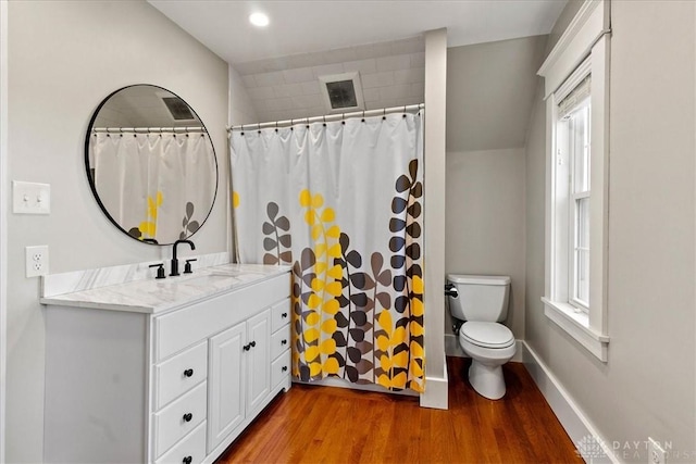 203 W Plum St, Saint Paris, OH 43072 - bathroom featuring wood finished floors, toilet, vanity, baseboards, and recessed lighting