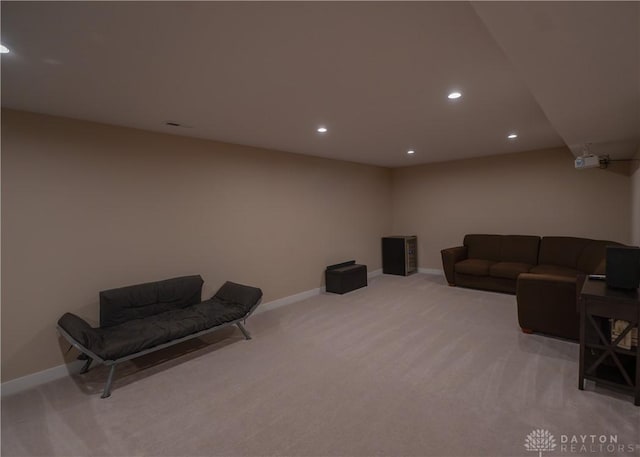 1180 Autumn Ridge Dr, Lebanon, OH 45036 - living room with light colored carpet, baseboards, visible vents, and recessed lighting