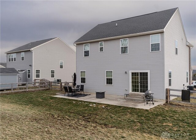 1180 Autumn Ridge Dr, Lebanon, OH 45036 - rear view of house featuring a fenced backyard, a patio area, a lawn, and entry steps