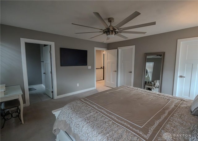 1180 Autumn Ridge Dr, Lebanon, OH 45036 - bedroom featuring carpet flooring, baseboards, a ceiling fan, and connected bathroom