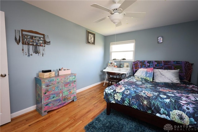 115 Southlake Dr, Dayton, OH 45459 - bedroom with wood finished floors, baseboards, and a ceiling fan